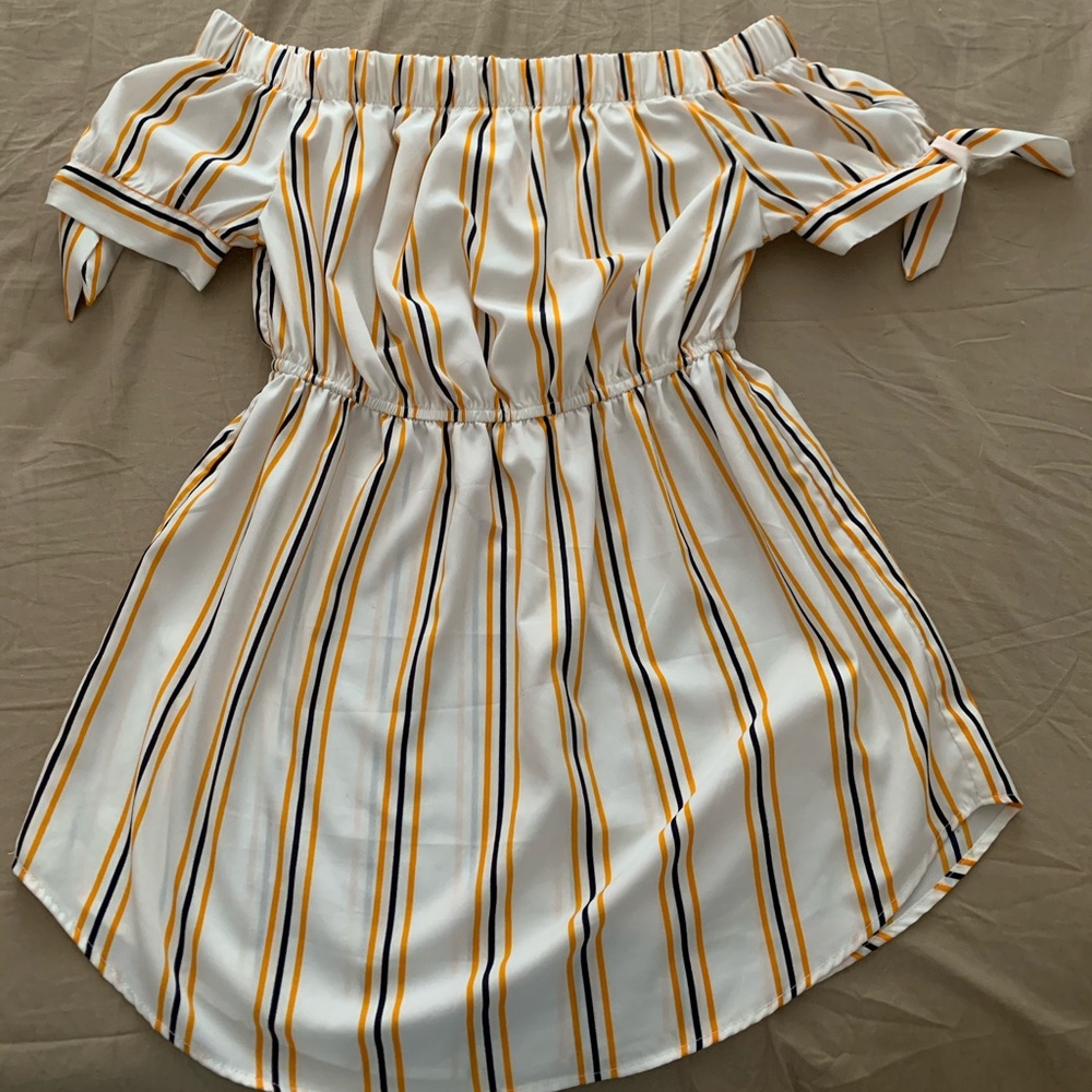 On sale is a summer dress and romper